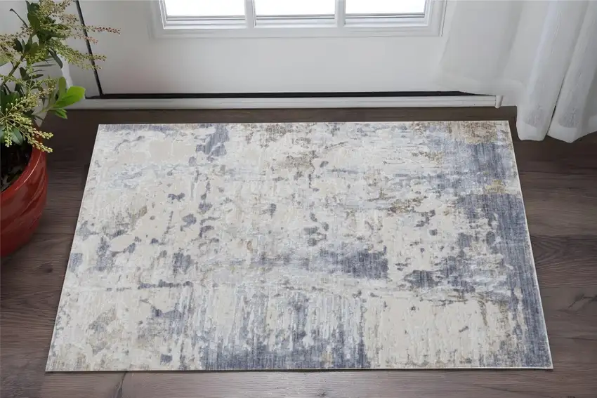 Ivory Gray and Blue Abstract Power Loom Worn Faded Area Rug Photo 1