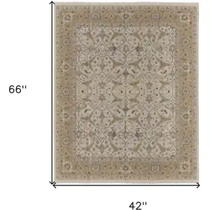 Photo of Ivory Gray and Tan Wool Oriental Hand Knotted Area Rug With Fringe