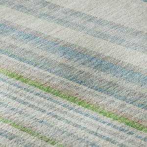 Photo of Ivory Green And Beige Striped Washable Area Rug With UV Protection