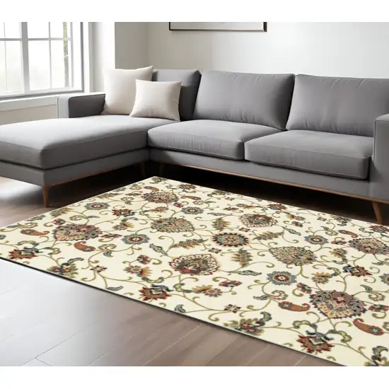 6' X 9' Ivory Green Blue Red Salmon And Yellow Floral Power Loom Stain Resistant Area Rug Photo 1