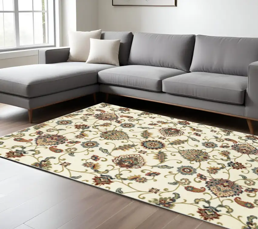 6' X 9' Ivory Green Blue Red Salmon And Yellow Floral Power Loom Stain Resistant Area Rug Photo 1