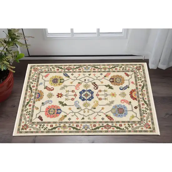 Ivory Green Blues Pink Yellow Rust Brown Tan And Grey Oriental Power Loom Stain Resistant Area Rug With Fringe Photo 1