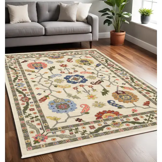 Green and Ivory Oriental Power Loom Area Rug With Fringe Photo 1