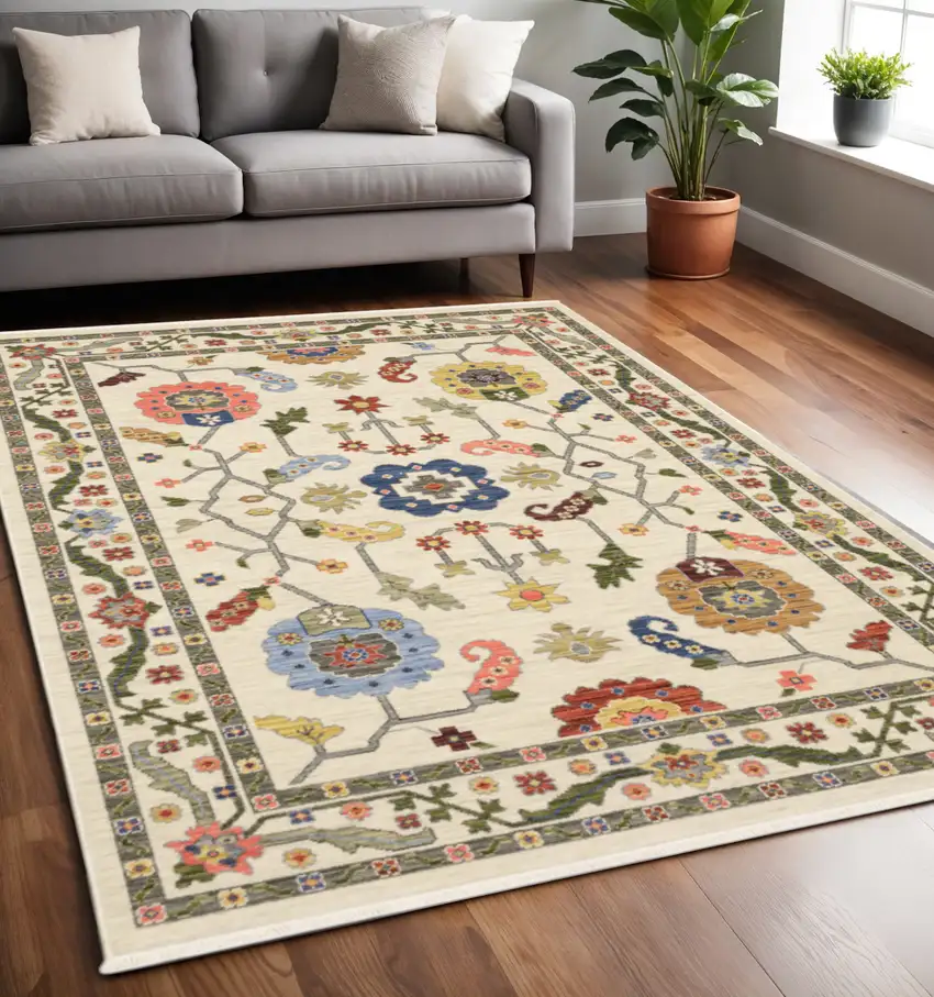 Green and Ivory Oriental Power Loom Area Rug With Fringe Photo 1