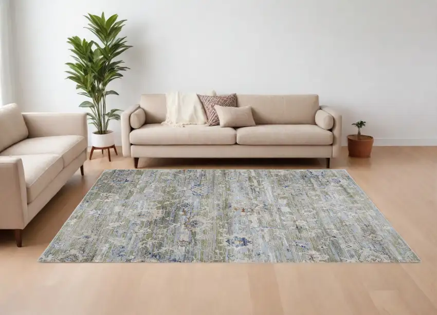 Ivory Green and Blue Floral Power Loom Worn Faded Area Rug Photo 1