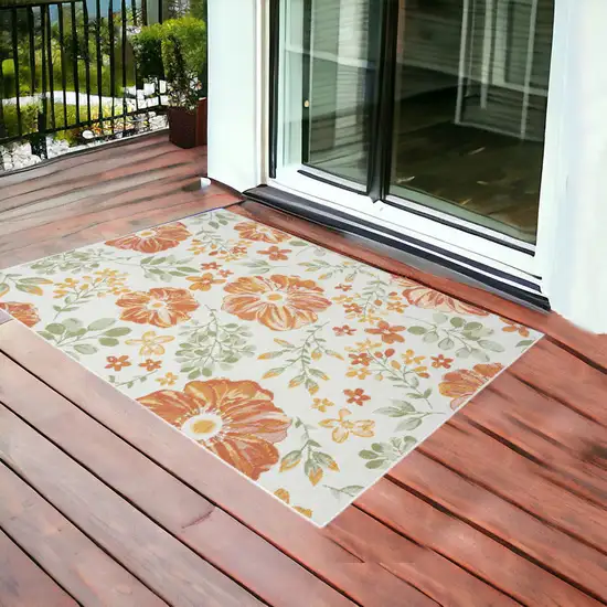 Ivory Green and Orange Floral Stain Resistant Indoor Outdoor Area Rug Photo 1