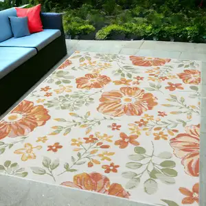 Photo of Ivory Green and Orange Floral Stain Resistant Indoor Outdoor Area Rug