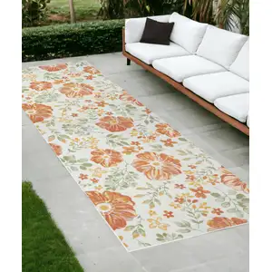 Photo of Ivory Green and Orange Floral Stain Resistant Indoor Outdoor Runner Rug