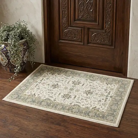 Ivory And Blue Oriental Area Rug Photo 1