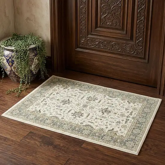Ivory And Blue Oriental Area Rug Photo 1