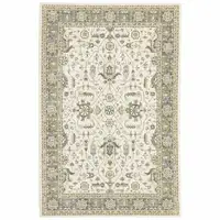 Photo of Ivory Grey And Blue Oriental Power Loom Stain Resistant Area Rug