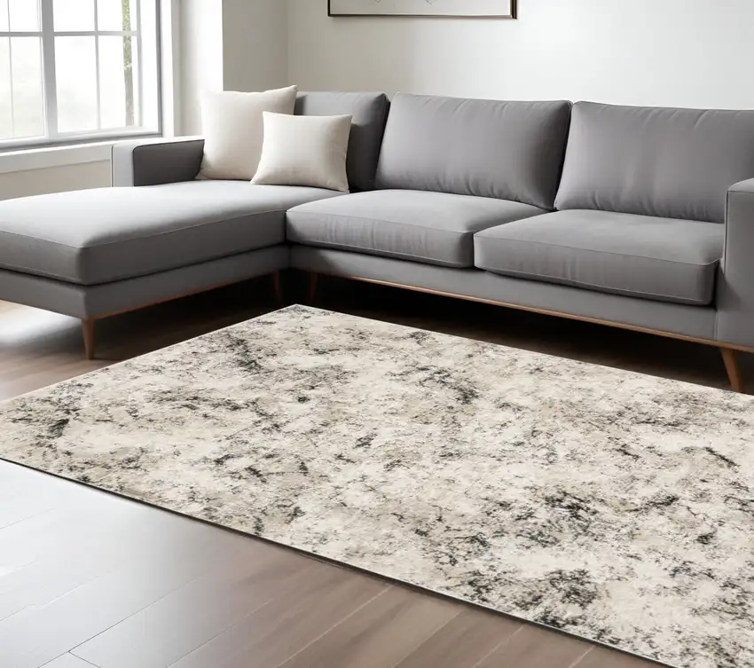 Gray and Ivory Abstract Power Loom Area Rug Photo 1