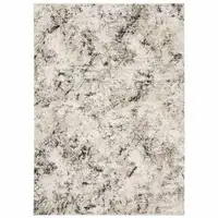 Photo of Ivory Grey Black Beige And Tan Abstract Power Loom Stain Resistant Area Rug