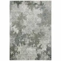 Photo of Ivory Grey Blue And Taupe Abstract Power Loom Stain Resistant Area Rug
