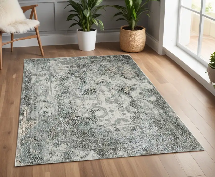 Gray and Ivory Oriental Power Loom Area Rug Photo 1