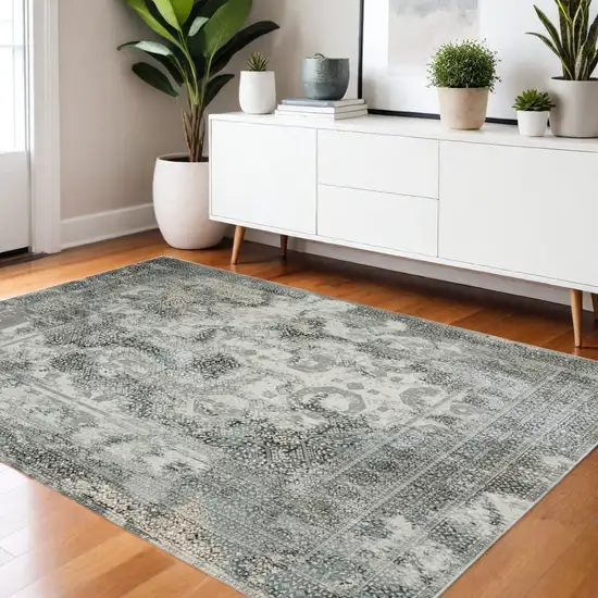 Gray And Ivory Oriental Distressed Area Rug Photo 1