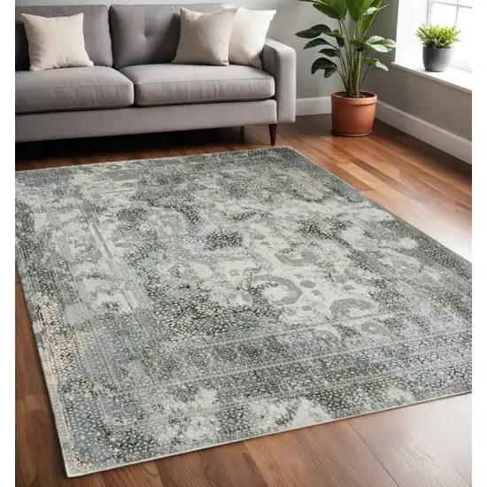 Gray And Ivory Oriental Distressed Area Rug Photo 1