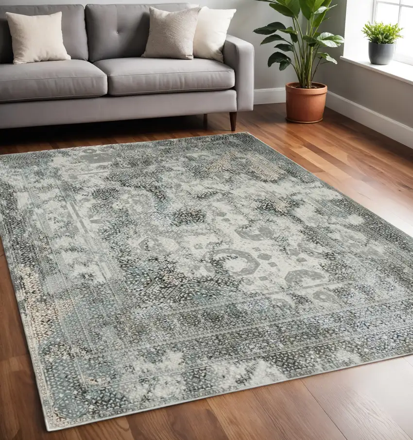 Gray And Ivory Oriental Distressed Area Rug Photo 1
