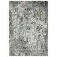 Photo of Ivory Grey Charcoal Blue And Rust Oriental Power Loom Stain Resistant Area Rug