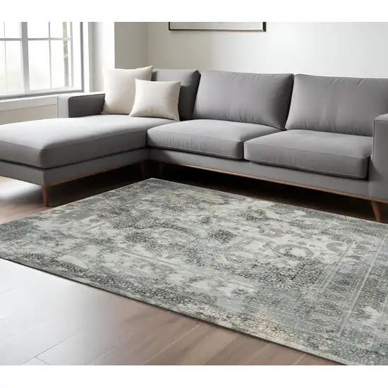 Ivory Grey Charcoal Blue And Rust Oriental Power Loom Stain Resistant Area Rug Photo 1