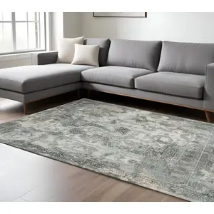 Photo of Ivory Grey Charcoal Blue And Rust Oriental Power Loom Stain Resistant Area Rug
