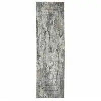 Photo of Ivory Grey Charcoal Blue And Rust Oriental Power Loom Stain Resistant Runner Rug