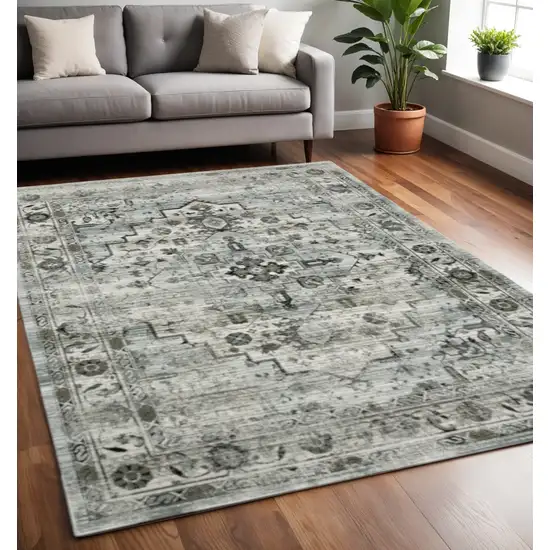 Ivory Grey Charcoal Blue And Taupe Oriental Power Loom Stain Resistant Area Rug Photo 1