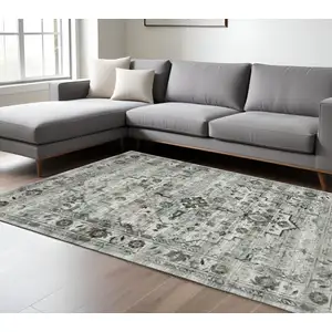 Photo of Ivory Grey Charcoal Blue And Taupe Oriental Power Loom Stain Resistant Area Rug