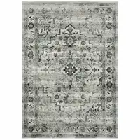 Photo of Ivory Grey Charcoal Blue And Taupe Oriental Power Loom Stain Resistant Area Rug