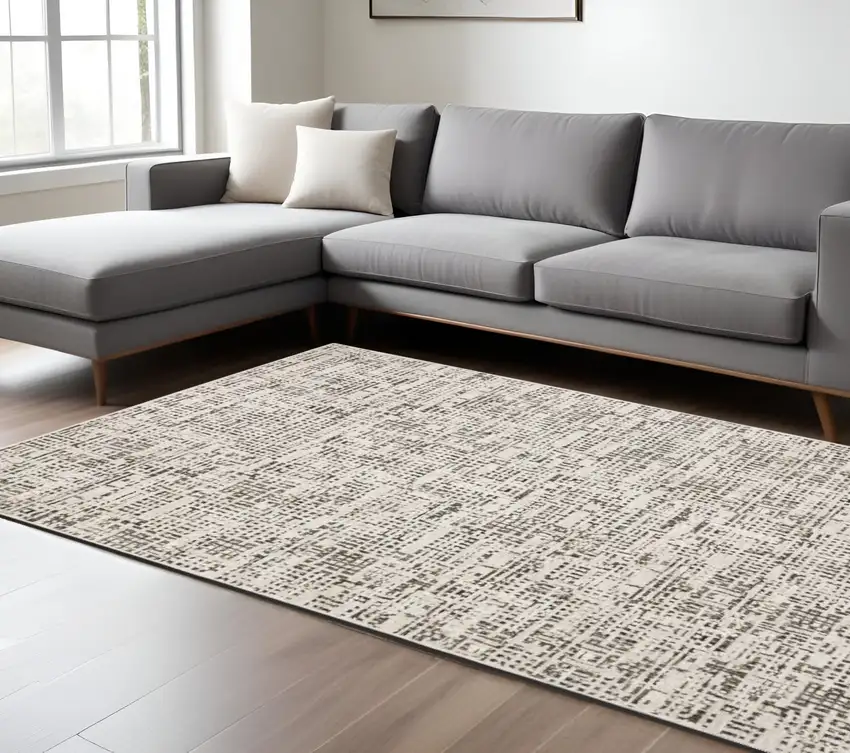 Gray and Ivory Abstract Power Loom Area Rug Photo 1