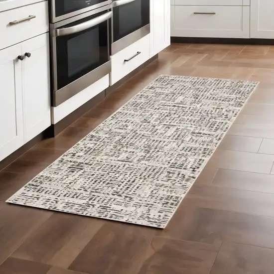 2' X 8' Ivory Grey Charcoal Brown And Beige Abstract Power Loom Stain Resistant Runner Rug Photo 1