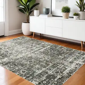 Photo of Ivory Grey Charcoal Rust Gold And Brown Oriental Power Loom Stain Resistant Area Rug