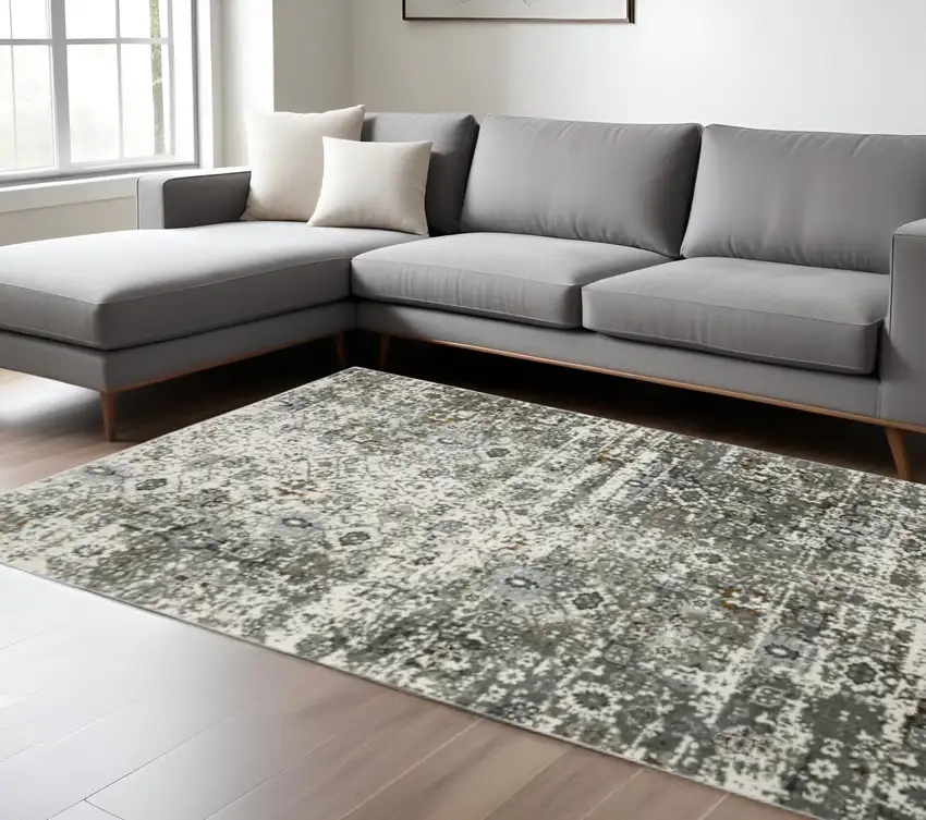 6' X 9' Ivory Grey Charcoal Rust Gold And Brown Oriental Power Loom Stain Resistant Area Rug Photo 1