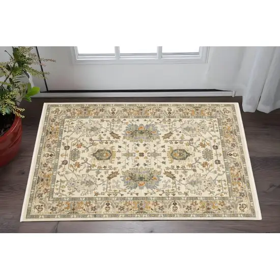 Ivory Grey Orange Green Blue And Red Oriental Power Loom Stain Resistant Area Rug With Fringe Photo 1
