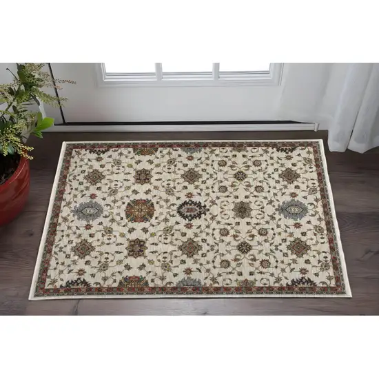 Ivory Grey Rust Red Gold And Shades Of Blue Oriental Power Loom Stain Resistant Area Rug With Fringe Photo 1