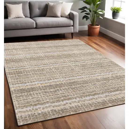 Gray and Ivory Abstract Power Loom Area Rug Photo 1