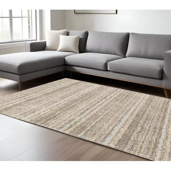Gray and Ivory Abstract Power Loom Area Rug Photo 1