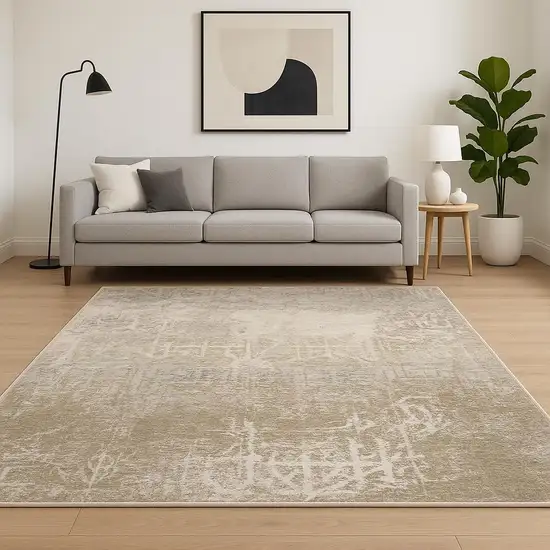 6' X 9' Ivory Grey Tan Brown And Beige Abstract Power Loom Stain Resistant Area Rug Photo 1
