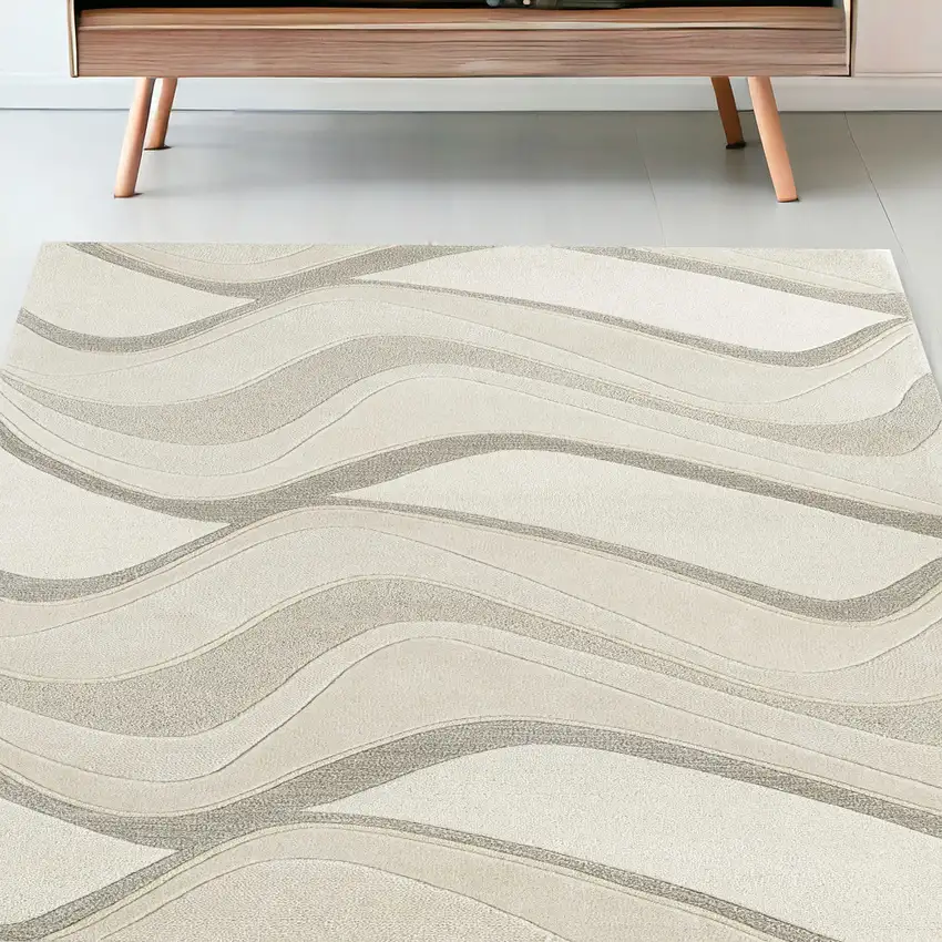 5'X8' Ivory Hand Tufted Abstract Waves Indoor Area Rug Photo 1