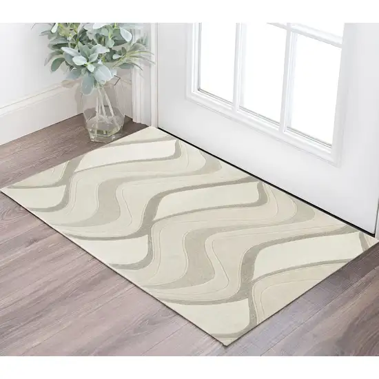 Ivory And Beige Wool Abstract Hand Tufted Area Rug Photo 1