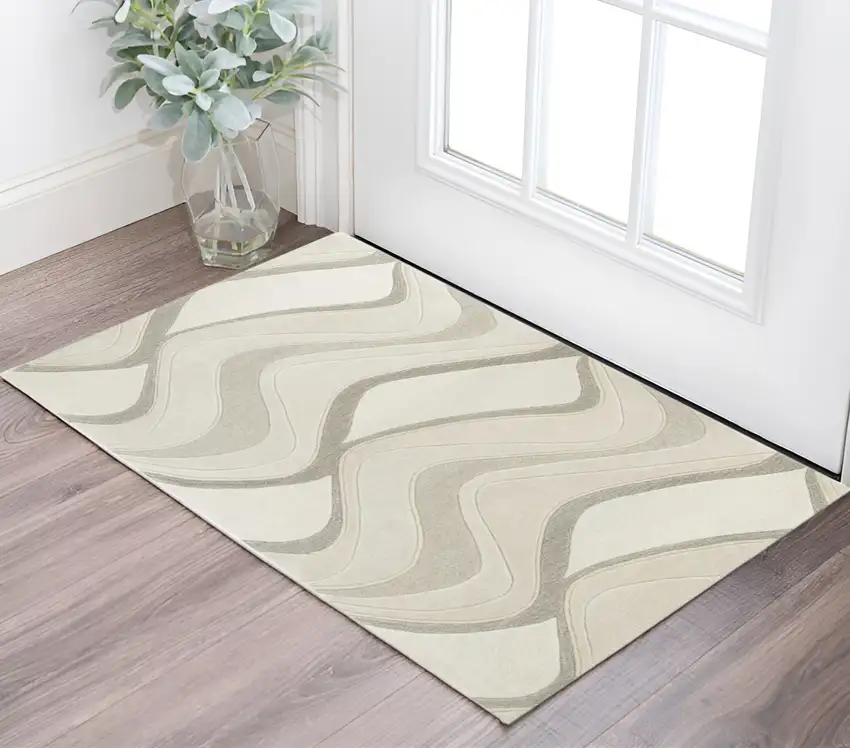 Ivory And Beige Wool Abstract Hand Tufted Area Rug Photo 1