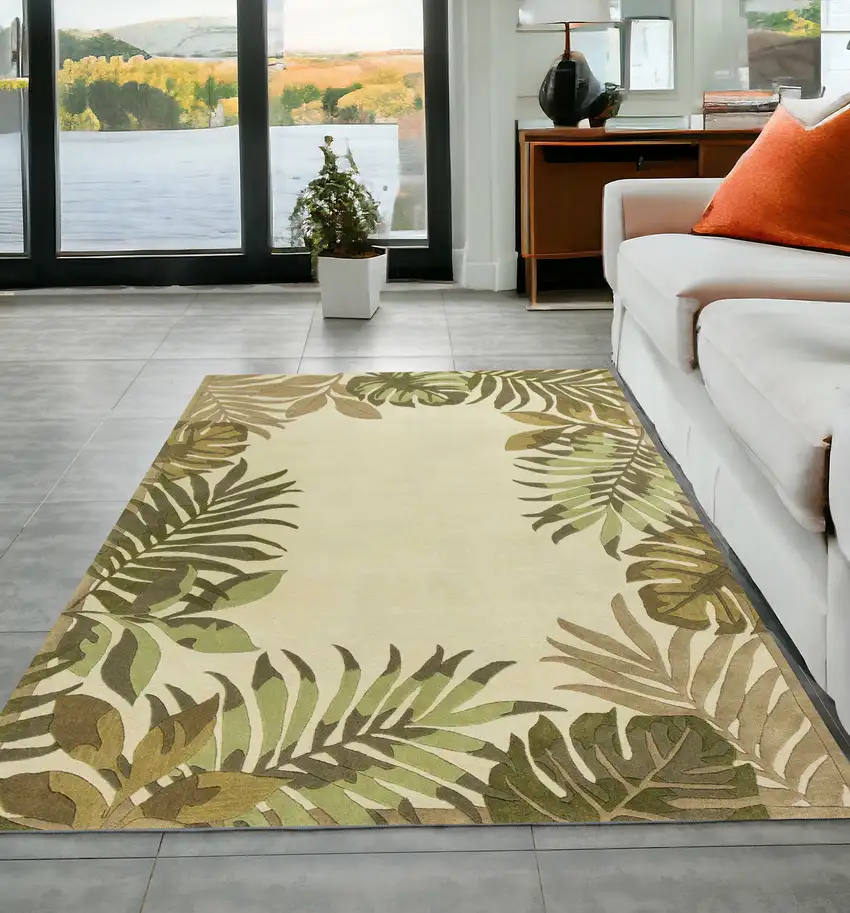 5'X8' Ivory Hand Tufted Bordered Tropical Leaves Indoor Area Rug Photo 1