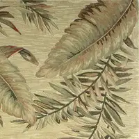 Photo of Ivory Hand Tufted Tropical Leaves Round Indoor Area Rug