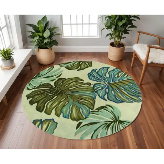 8' Brown Blue And Green Wool Tropical Botanical Hand Tufted Round Rug Photo 1