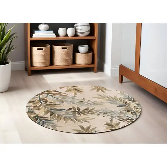6' Ivory Brown And Blue Wool Botanical Leaves Hand Tufted Round Rug Photo 1
