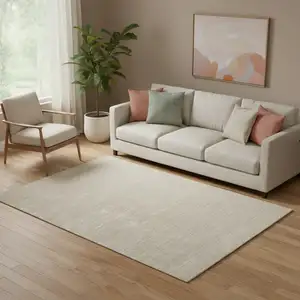 Photo of Ivory Hand Woven Area Rug