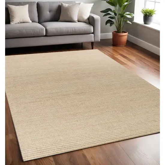 Tan And Ivory Hand Woven Area Rug Photo 1