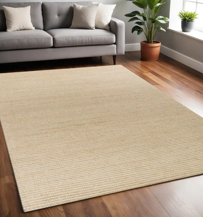 Tan And Ivory Hand Woven Area Rug Photo 1