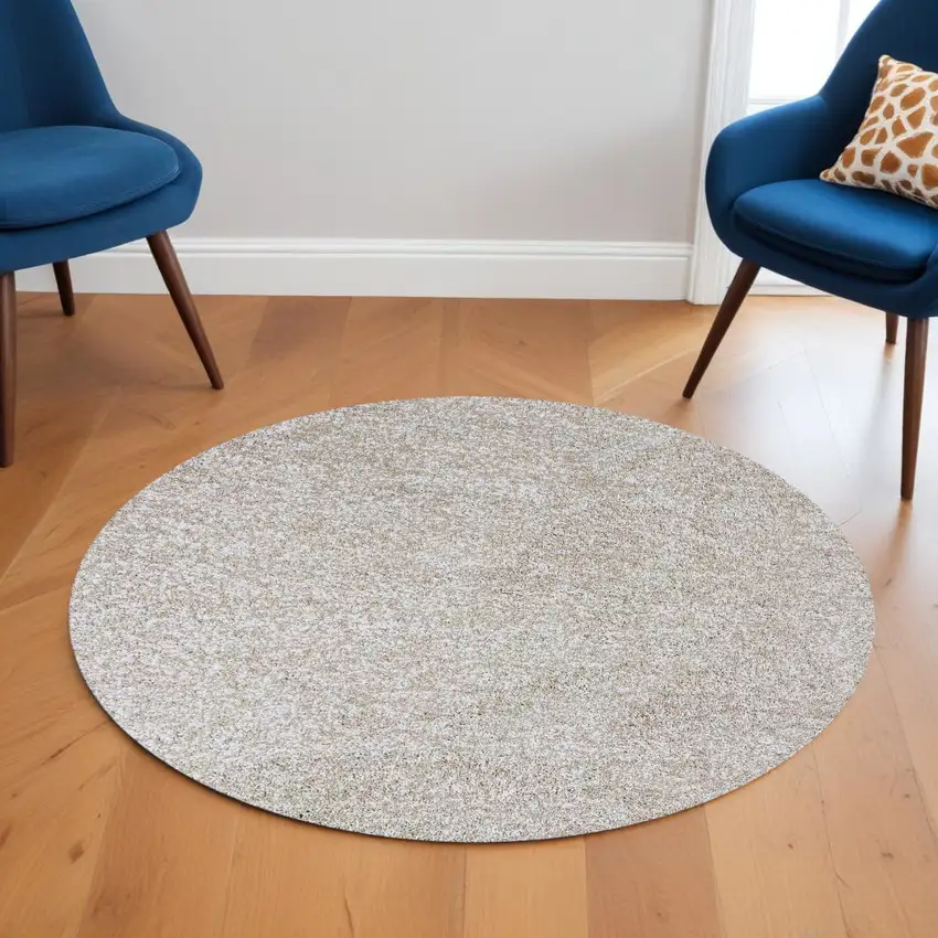 6' Ivory Hand Woven Round Rug Photo 1