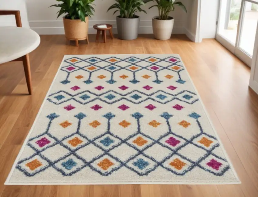Ivory And Blue Geometric Area Rug Photo 2